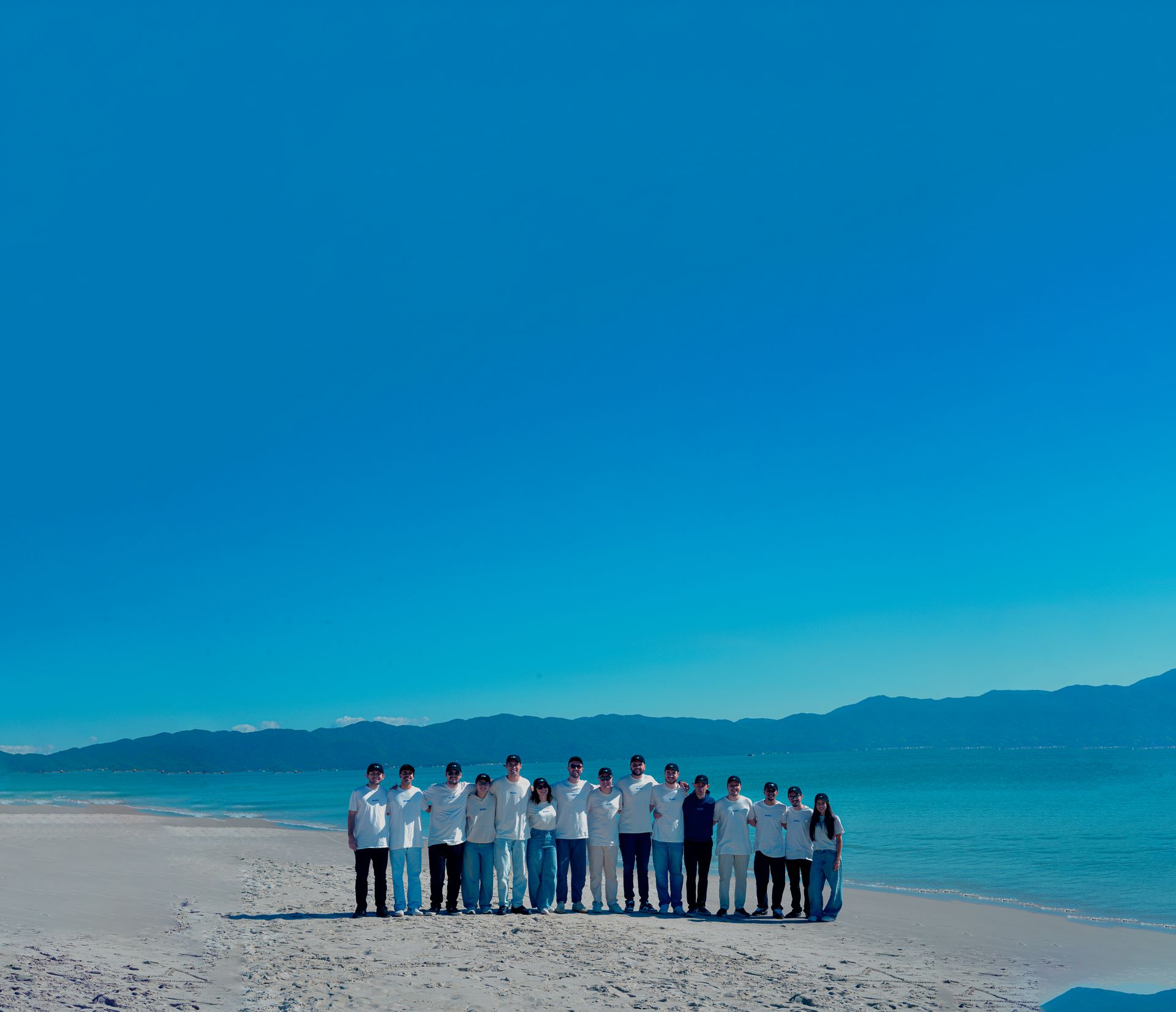 The Bleu team on the beach in Florianópolis